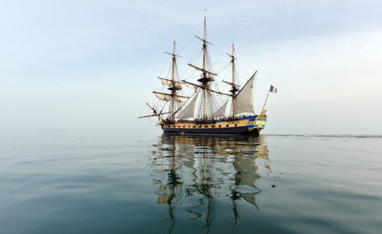 TOPSHOTS
The replica of the French frigate Hermione sails out of the old harbour in La Rochelle on April 15, 2015. The boat is scheduled to cross the Atlantic ocean in April and May 2015 in the footsteps of its illustrious predecessor built in the XVIIIth century.  AFP PHOTO / XAVIER LEOTY